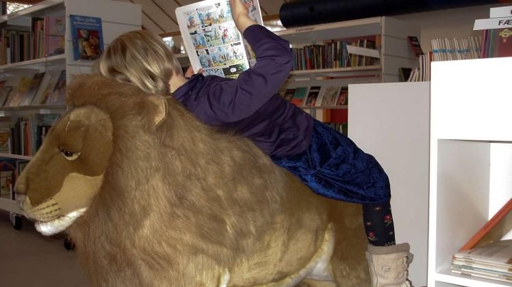 barn på bibliotek